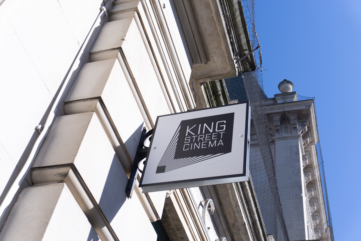 King Street Cinema sign hanging outside the building
